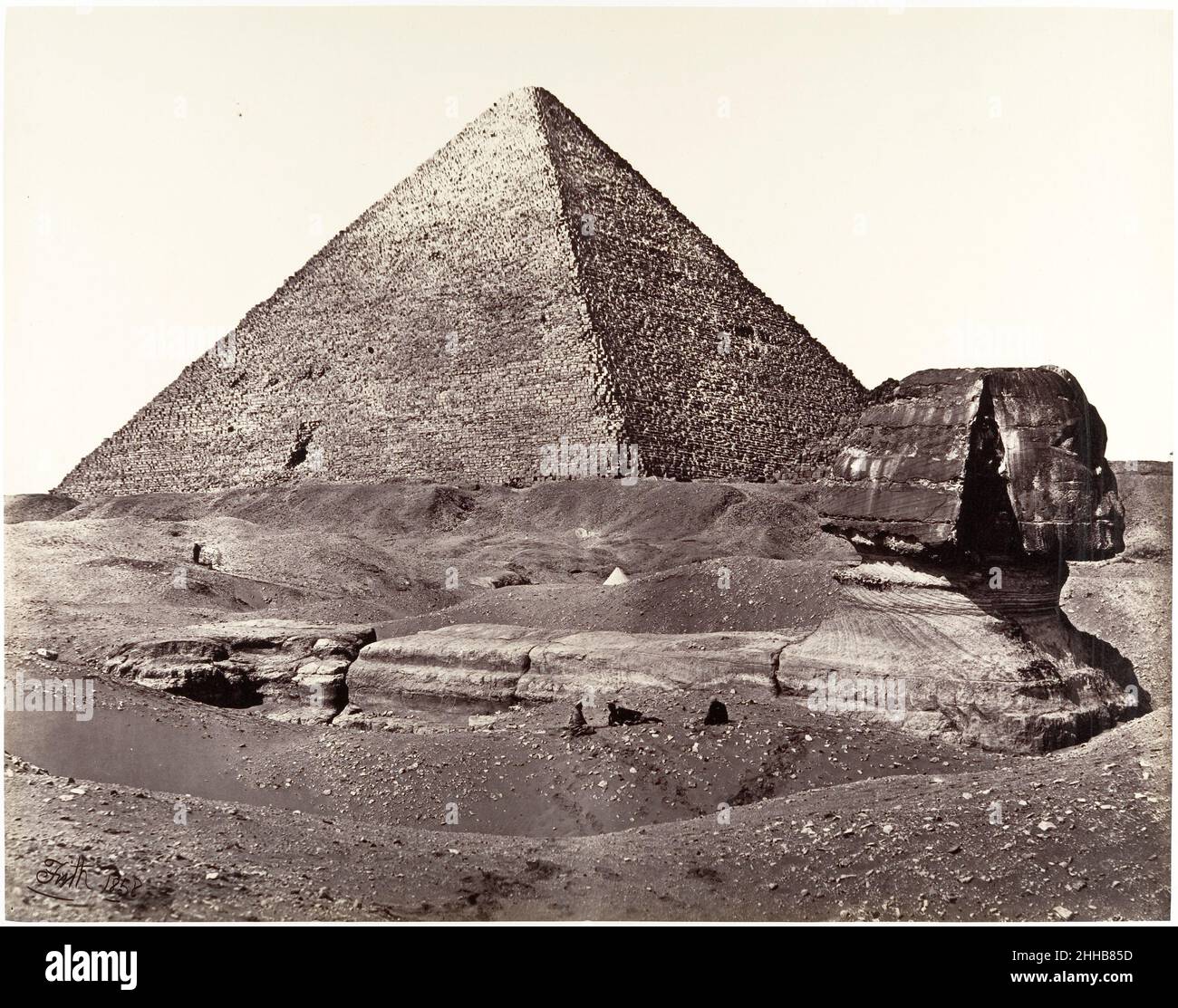 The Great Pyramid and The Great Sphinx 1858 Francis Frith British In 1856 Frith set out on the first of three trips to the Middle East, launching a highly successful career as a photographer and publisher of foreign topographic views. It is miraculous that he succeeded in making monumental and theatrical views such as this one, for the relatively new glass negatives required him to transport his enormous camera, sheets of glass, and bottles of chemicals through the desert and to coat, expose, and develop his plates before the collodion emulsion dried. 'With the thermometer at 110° in my tent,' Stock Photo