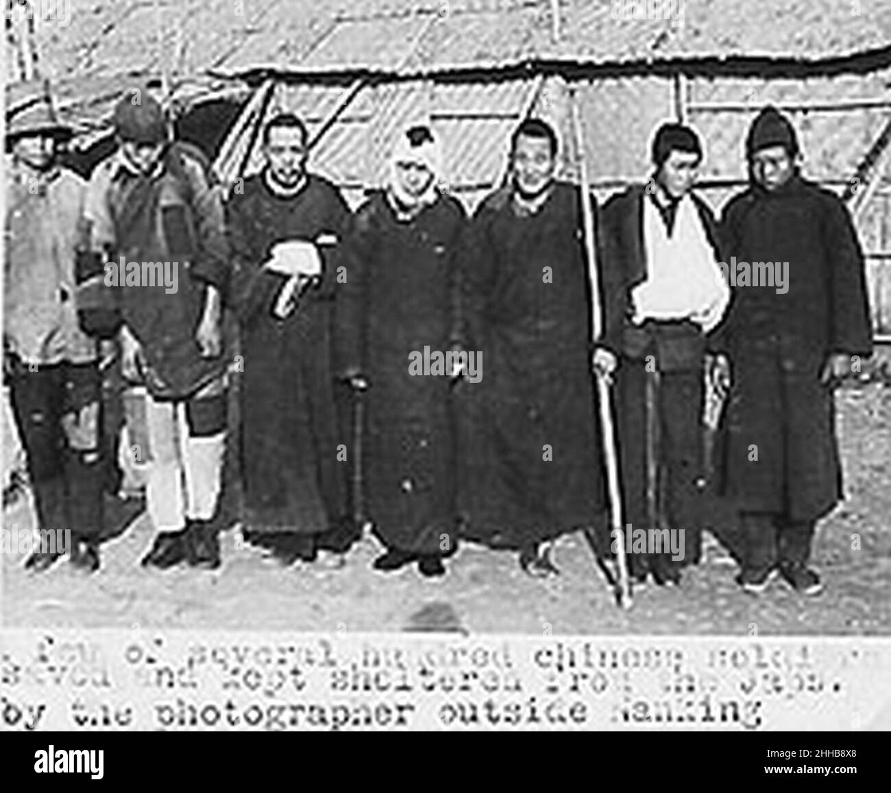 Some Chinese saved by Sindberg outside Nanjing, Nanjing Massacre. Stock Photo