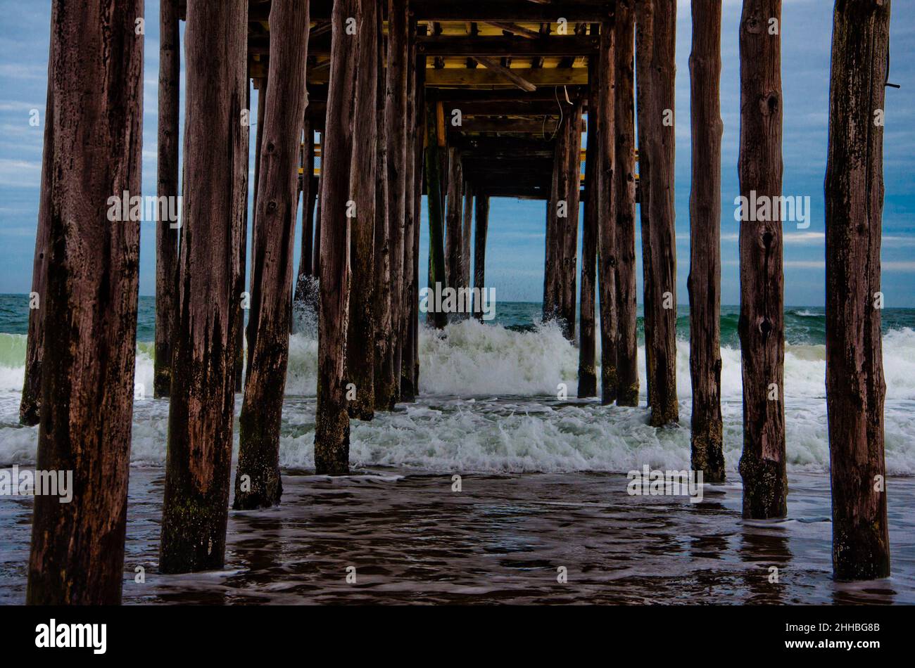 Photo of Breakers Under the Boardwalk, Ocean City Maryland USA Stock
