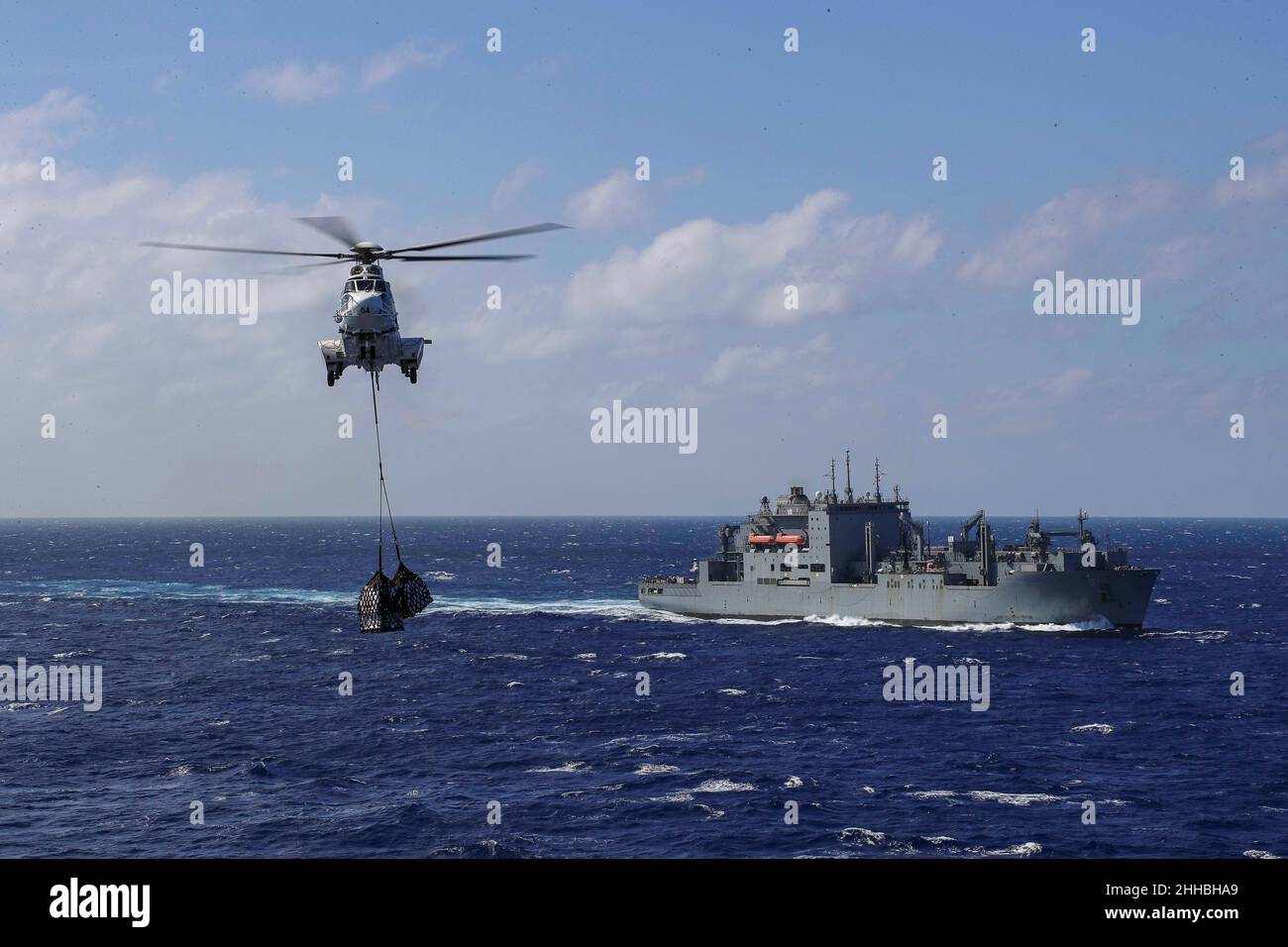 PHILIPPINE SEA (Jan. 20, 2022) An AS332 Super Puma transports cargo ...