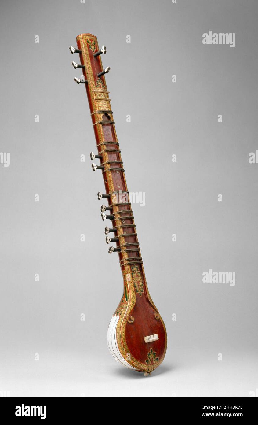 Sitar late 19th Century Indian This small sitar has a body made of