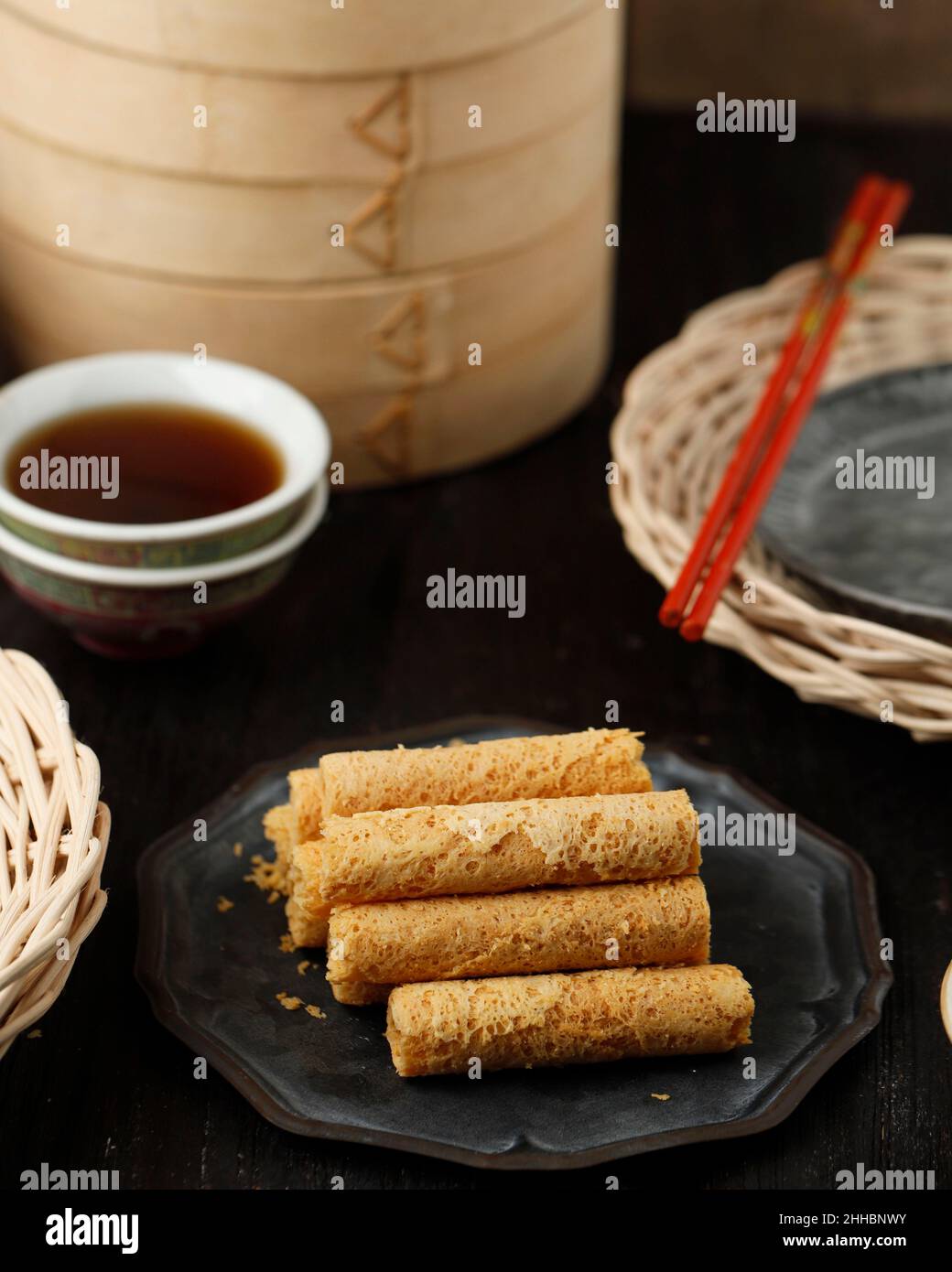 Chinese New Year CNY Egg Roll on Rustic Plate Stock Photo Alamy