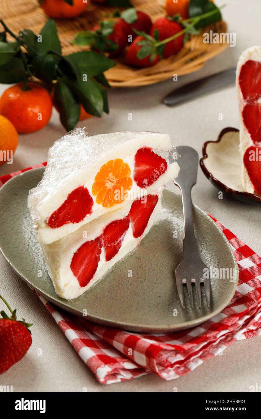 Japanese Fruit Sandwich, Popular Asian Dessert Fruit Sando with Strawberry and Orange Stock