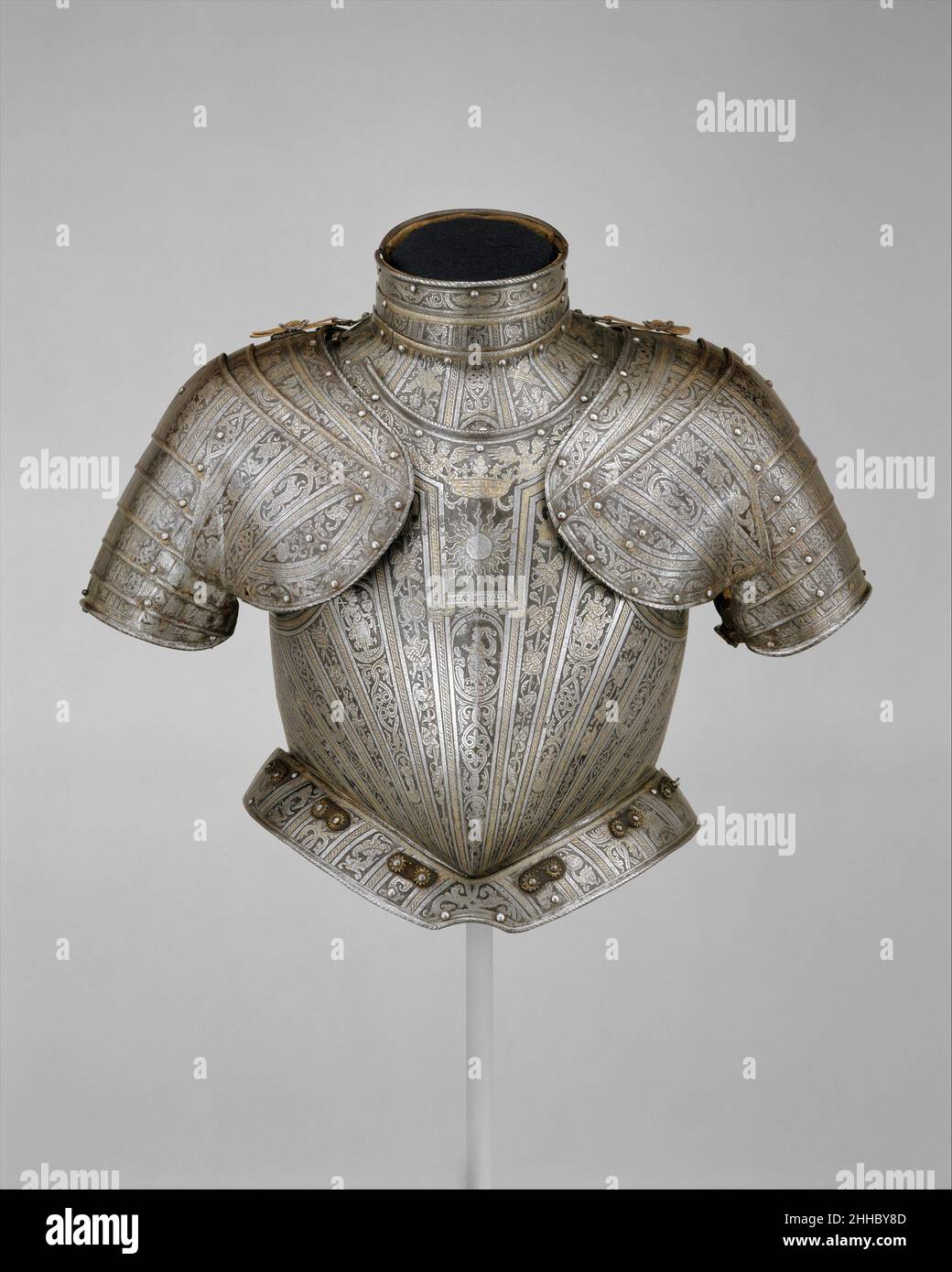 Portions of an Armor for Vincenzo Luigi di Capua (d. 1627) ca. 1595 Pompeo della Cesa Italian These elements form part of a light-cavalry or infantry armor made for the Neapolitan nobleman Vincenzo Luigi di Capua (d. 1627), count of Altavilla and prince of Riccia. The breastplate bears his personal impresa (emblem), a sunburst above the motto Nulla Quies Alibi (No Repose But Here).Pompeo della Cesa, whose etched signature “Pompeo” is found near the top of the breastplate in the center, was the foremost Milanese armorer of the late sixteenth century. His patrons included Philip II of Spain, who Stock Photo