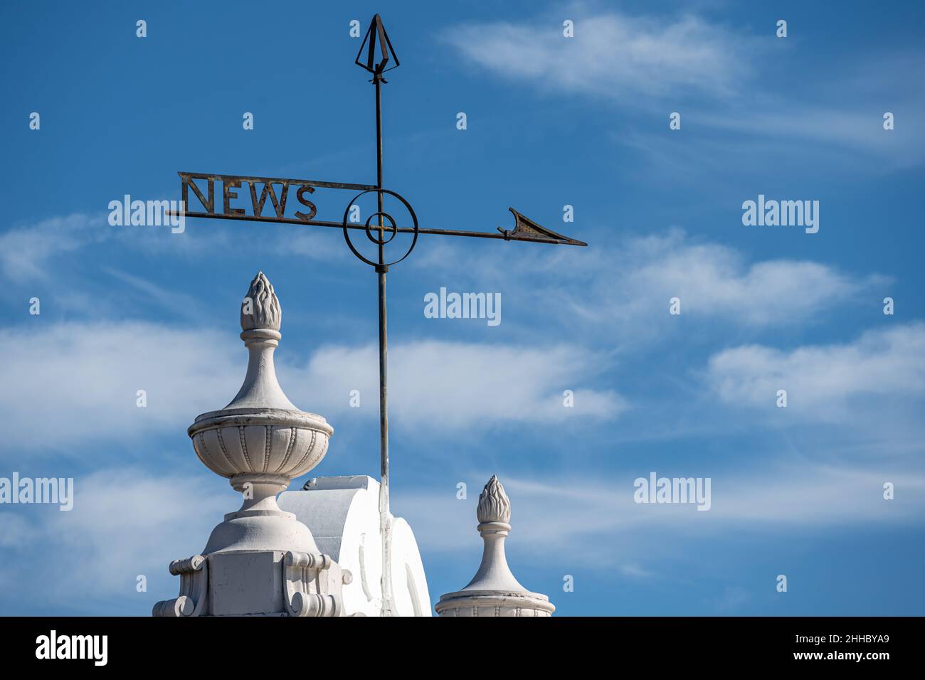 Vintage NEWS weather vane atop a building near the Chattahoochee River in Uptown Columbus, Georgia. (USA) Stock Photo