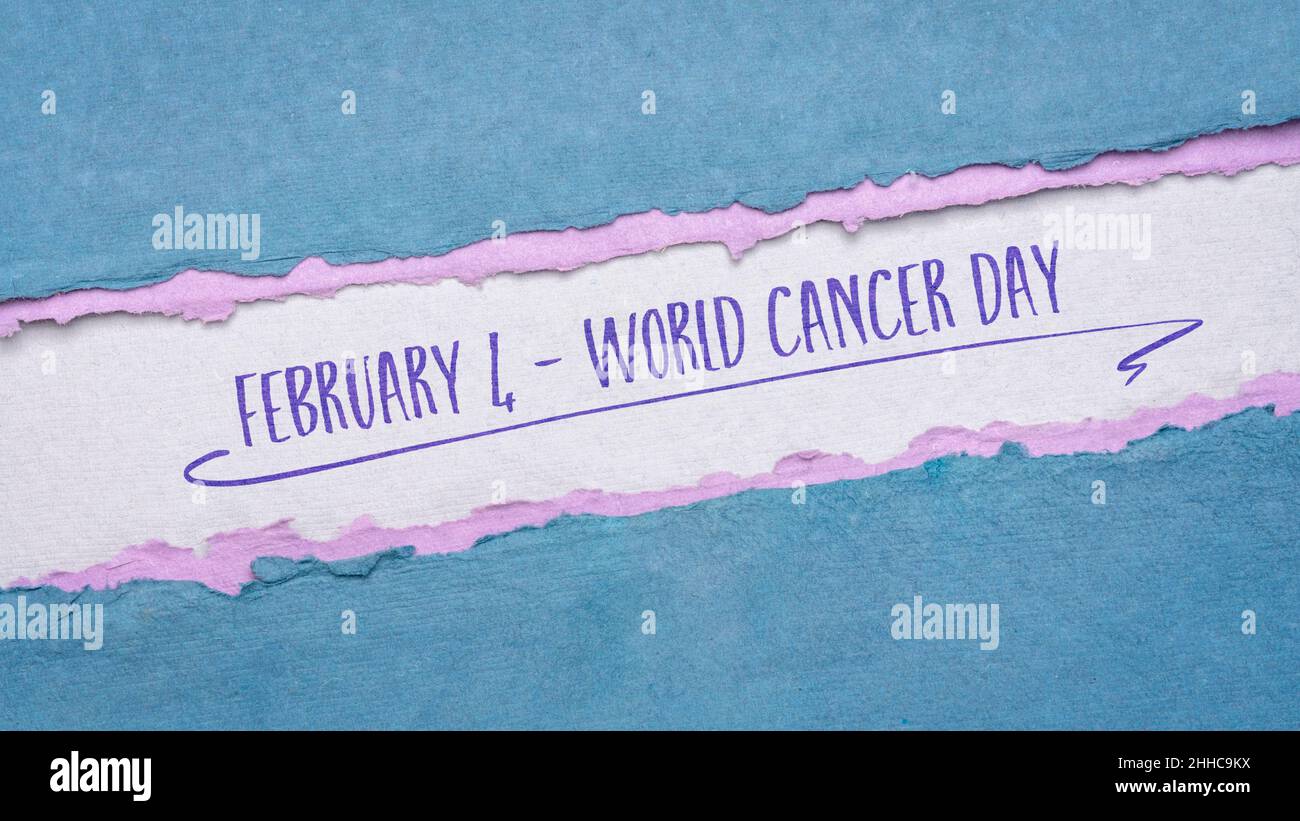 World Cancer Day, February 4 - handwriting and wooden block calendar, event to raise awareness of cancer, its prevention, detection, and treatment Stock Photo