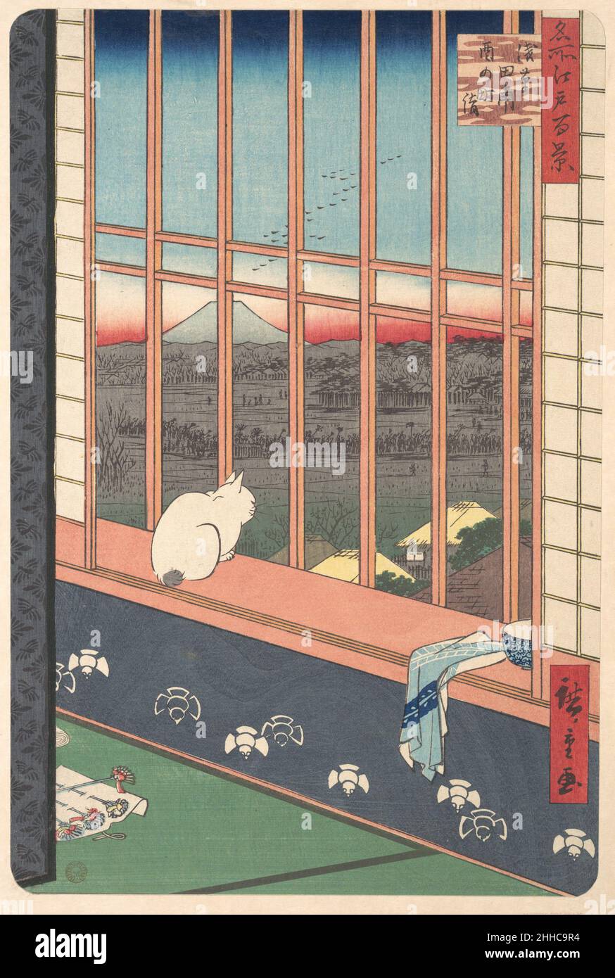 Revelers Returned from the Tori no Machi Festival at Asakusa, from the series One Hundred Famous Views of Edo 1857 Utagawa Hiroshige Japanese The inscription on this print tells us that the scene is located in Asakusa Tammbo, a famous gay quarter located in the eastern part of Edo. One can therefore surmise that this is one of the geisha houses for which Asakusa Tammbo was known. Perhaps the hostess and her guest are on the other side of he folding screen, which stands on the left side of the composition. Since the ceramic bowl and towel appear to have been set out for morning washing and brus Stock Photo