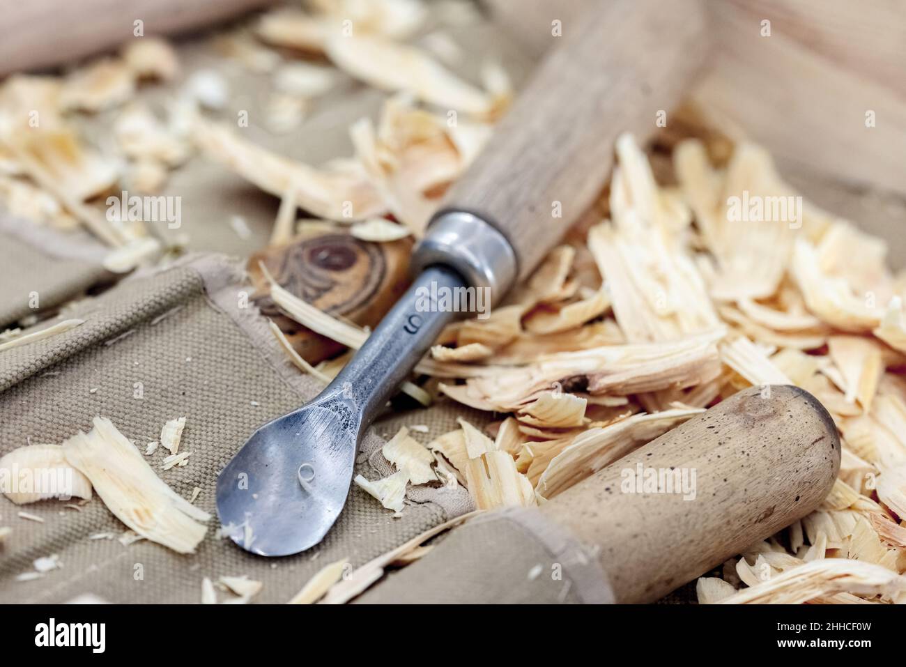 Carpenter tools in wood sawdust on workbench Stock Photo