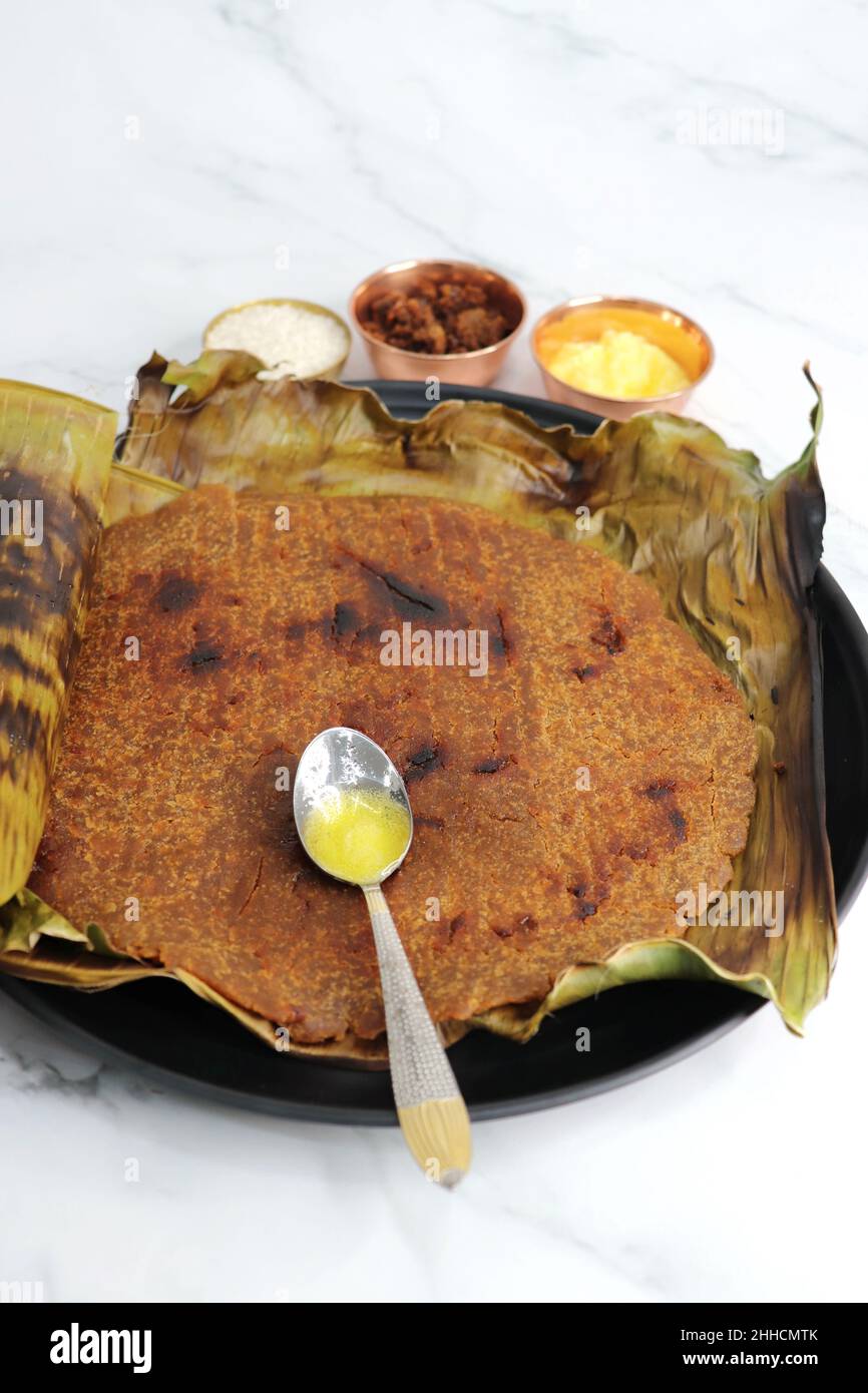 Sweet roti made out of rice flour, jaggery, and ghee. Gud ki roti. gur