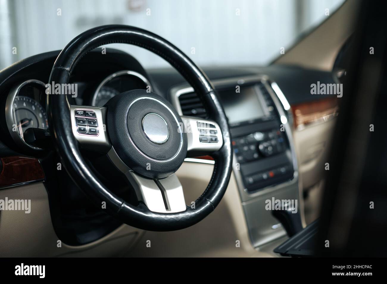 Modern car interior, steering wheel and dashboard Stock Photo - Alamy