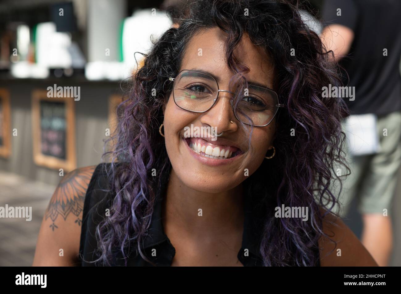 Woman with purple coloured hair Stock Photo