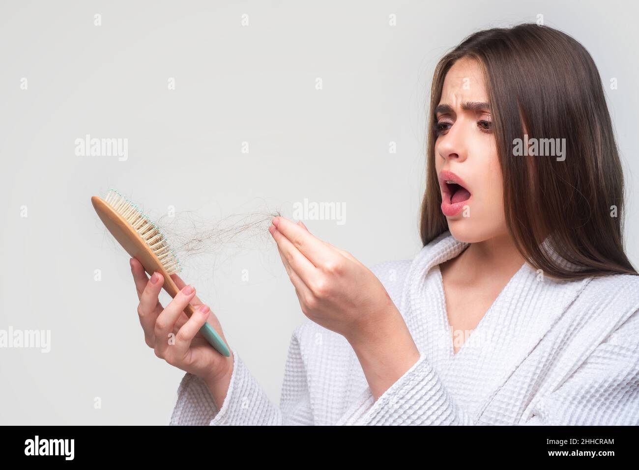 Woman loosing hair. Hair loss problem, baldness. Stock Photo