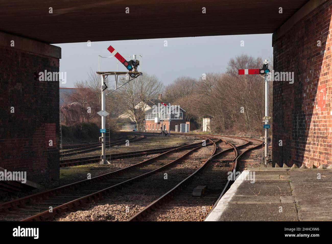 UK railways Bridlington signal box and upper quadrant semaphore signals.  The mechanical railway signals have since been removed Stock Photo