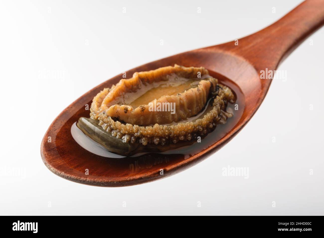 Abalone seasoned in soy sauce. Asian food culture. Seafood food Stock