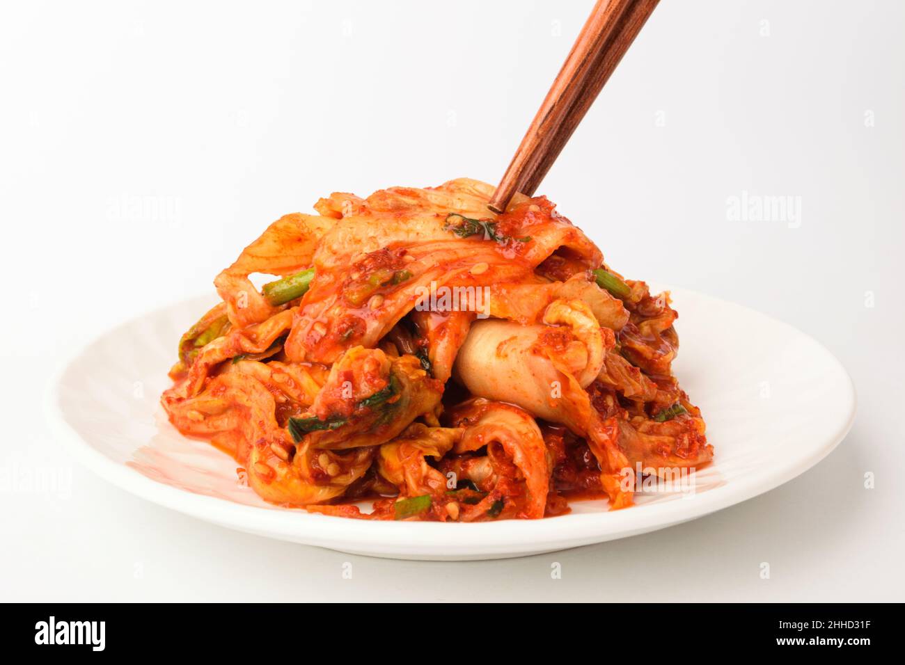 cabbage kimchi on a white background Stock Photo - Alamy