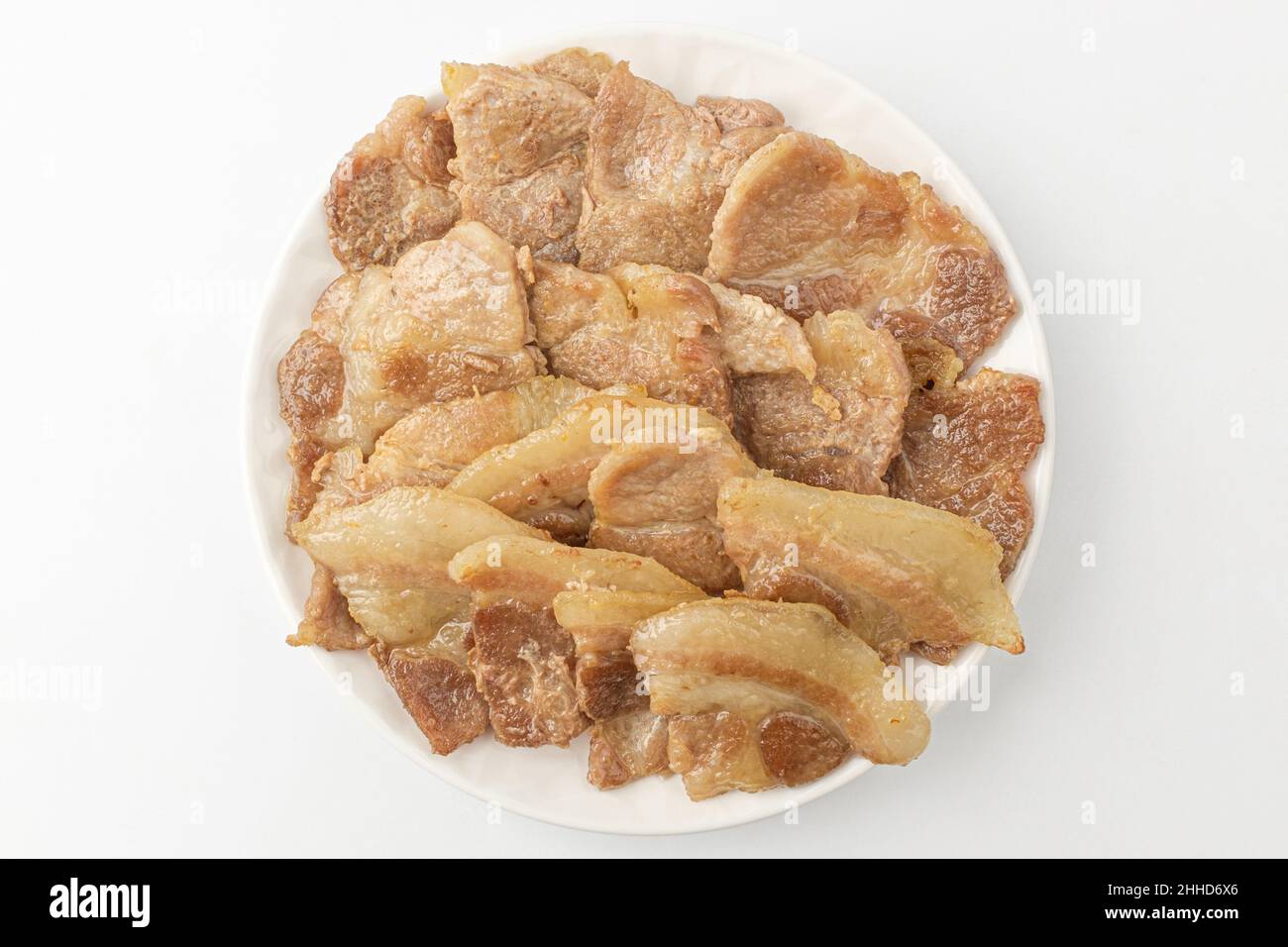 Roasted pork chop. Foods high in fat and protein. Thinly sliced pork neck Stock Photo