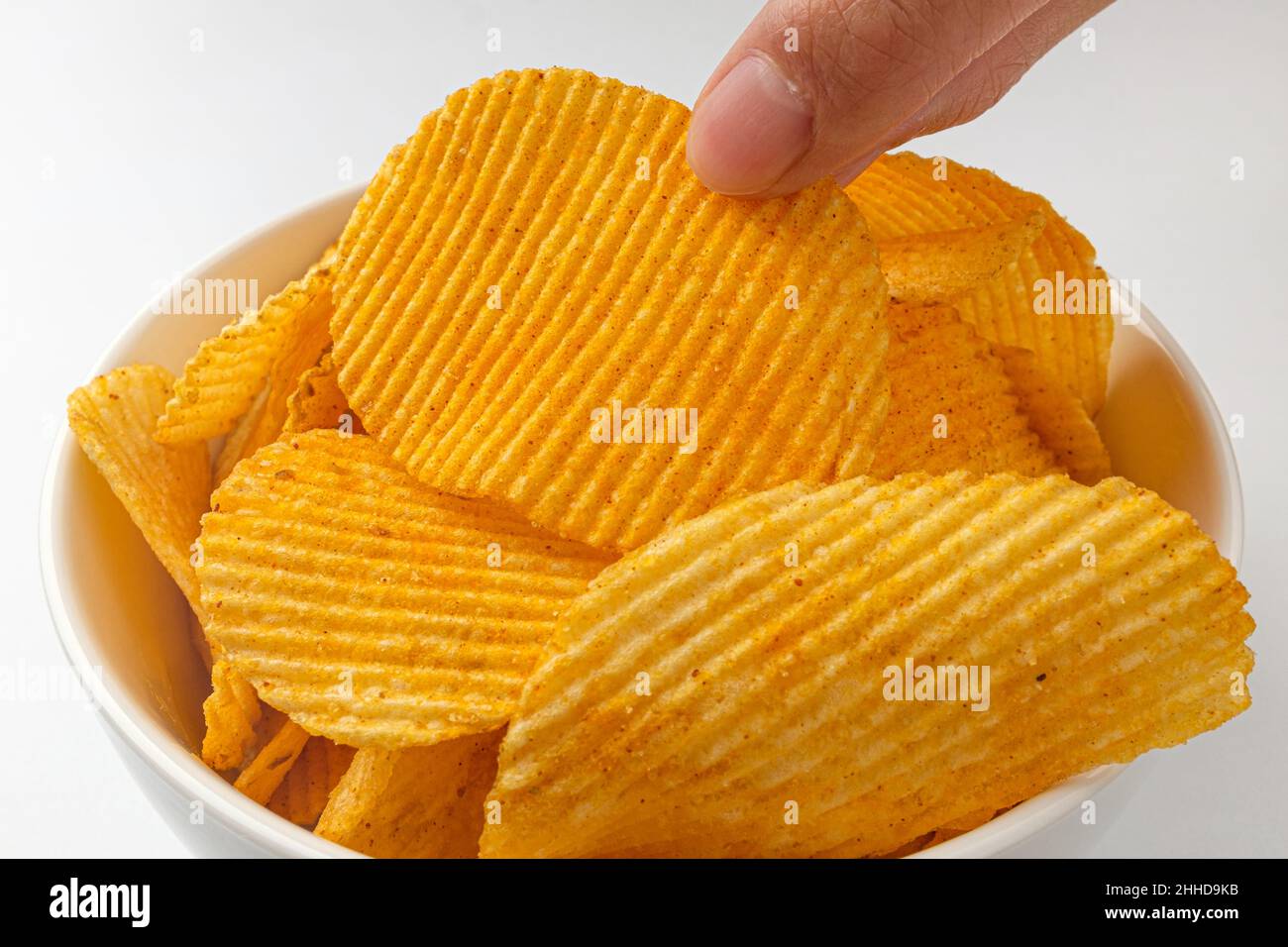 Potato snack. Potato Chips Seasoned with Pepper. Crunchy salty potato