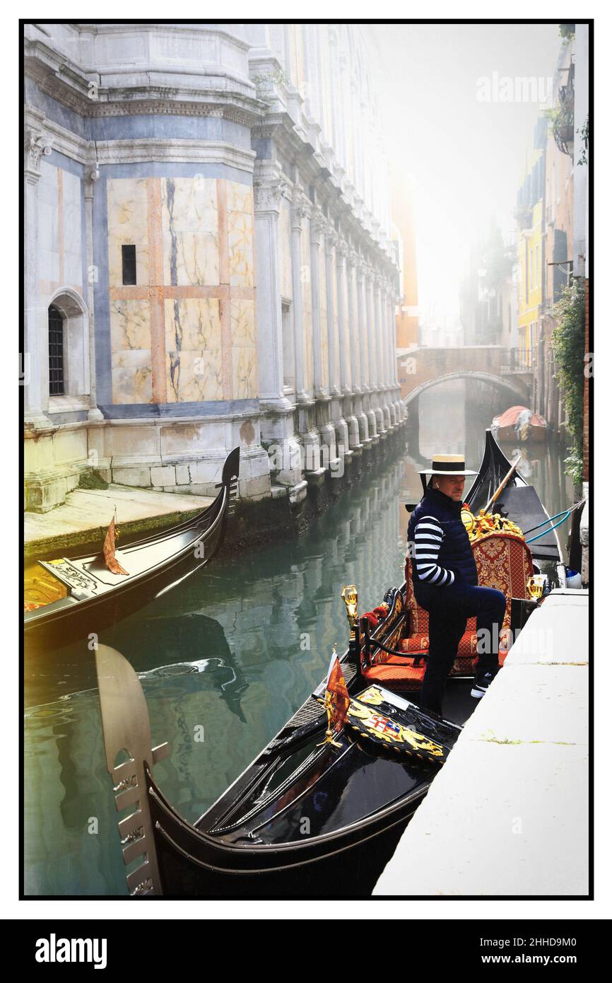 Romantic Venetian canals. Old narrow streets of Venice. Gondola and gondolier. Venice 30.10.21,Italy Stock Photo