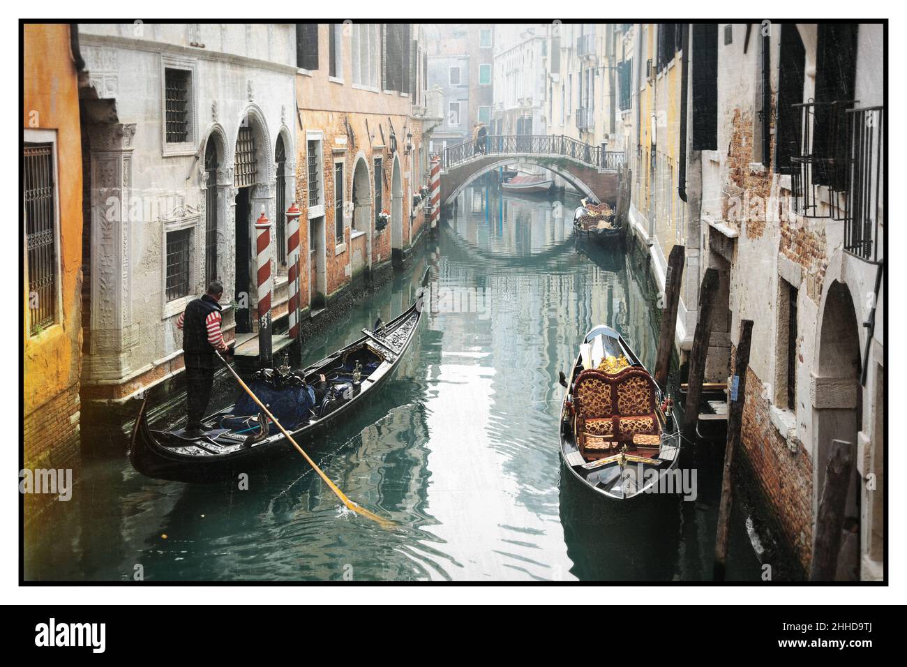 Romantic Venetian canals. Old narrow streets of Venice. Gondola trip. Retro styled picture. Italy Stock Photo
