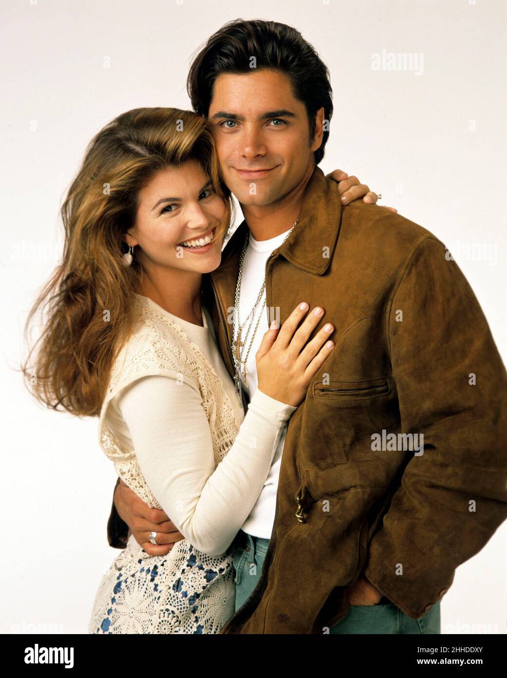 LORI LOUGHLIN and JOHN STAMOS in FULL HOUSE (1987), directed by JEFF FRANKLIN. Credit: LORIMAR PRODUCTIONS / Album Stock Photo