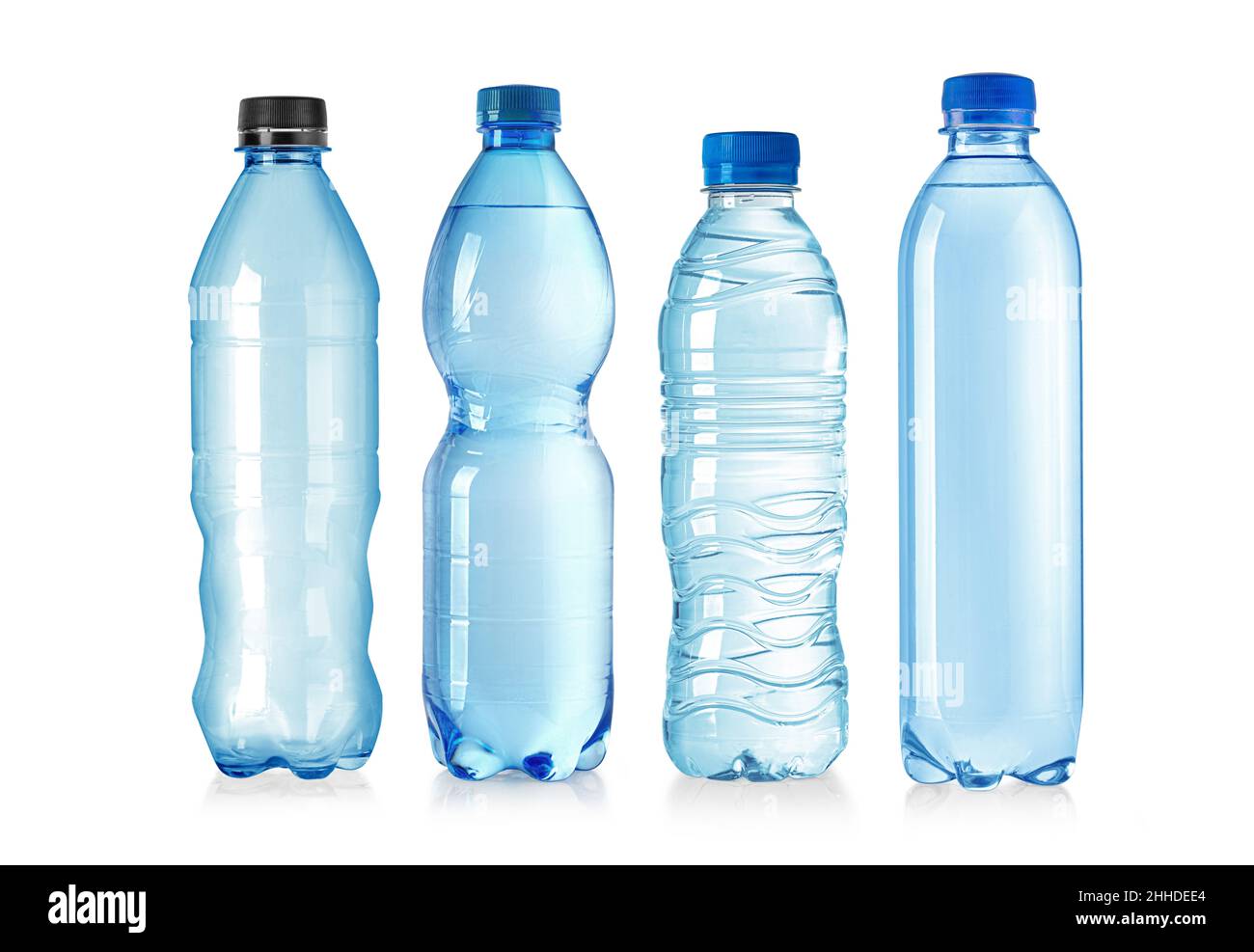 Set of plastic bottles with lids isolated on white background Stock