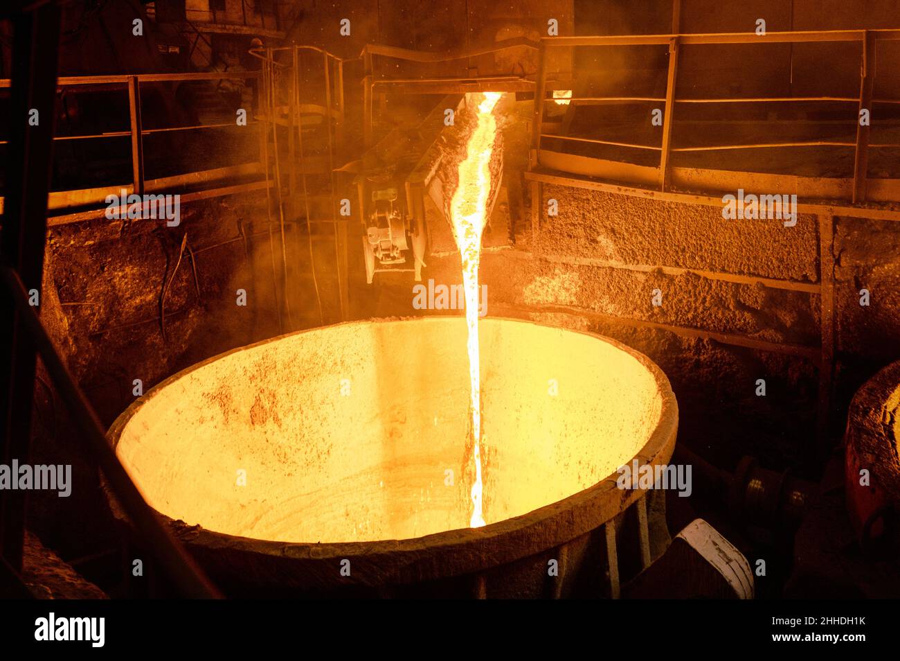 Blast furnace slag tapping. The molten slag is poured into a ladle
