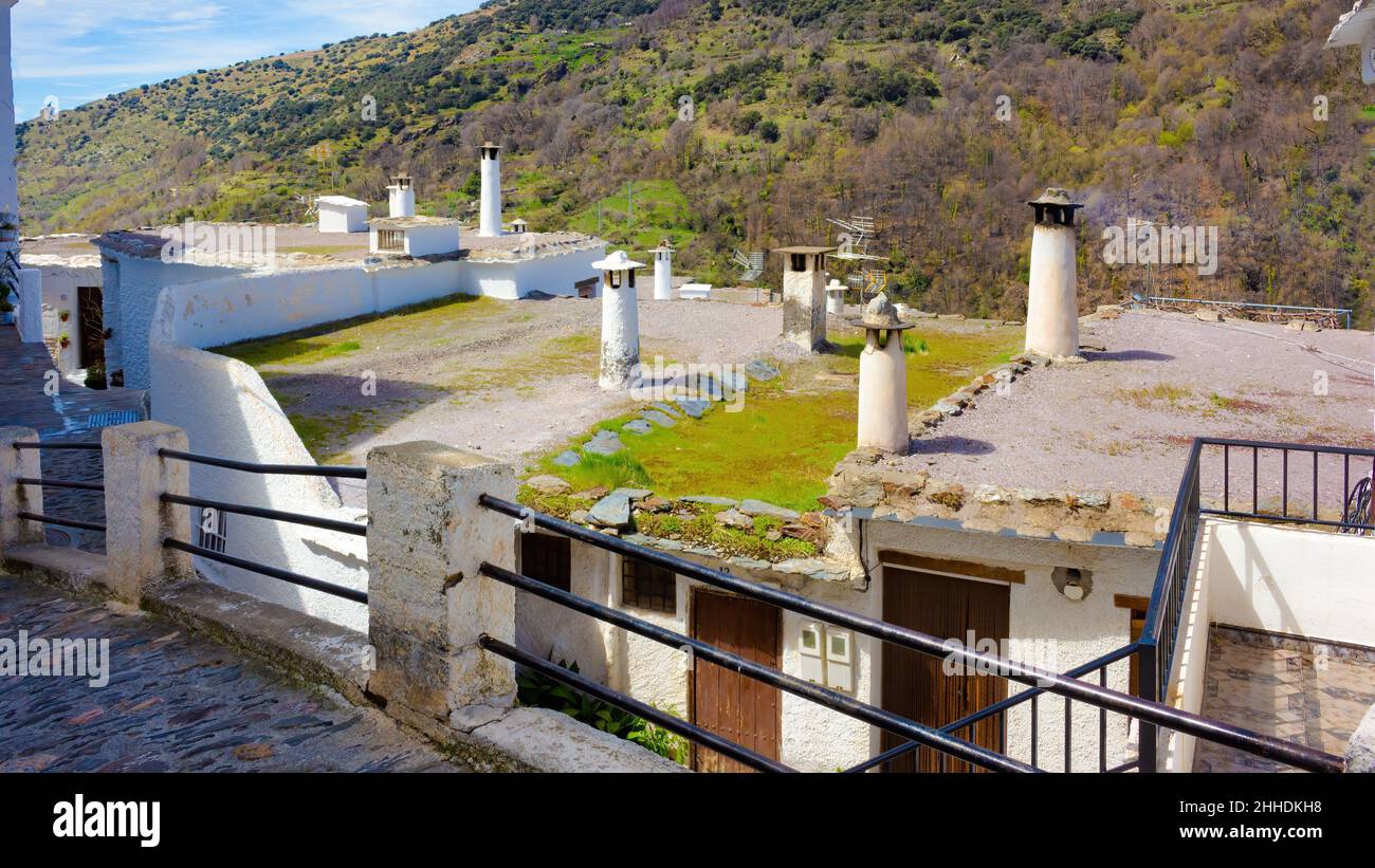 View of the typical terraces on the roof of the white houses.. Pampaneira, Andalusia, Spain: Stock Photo