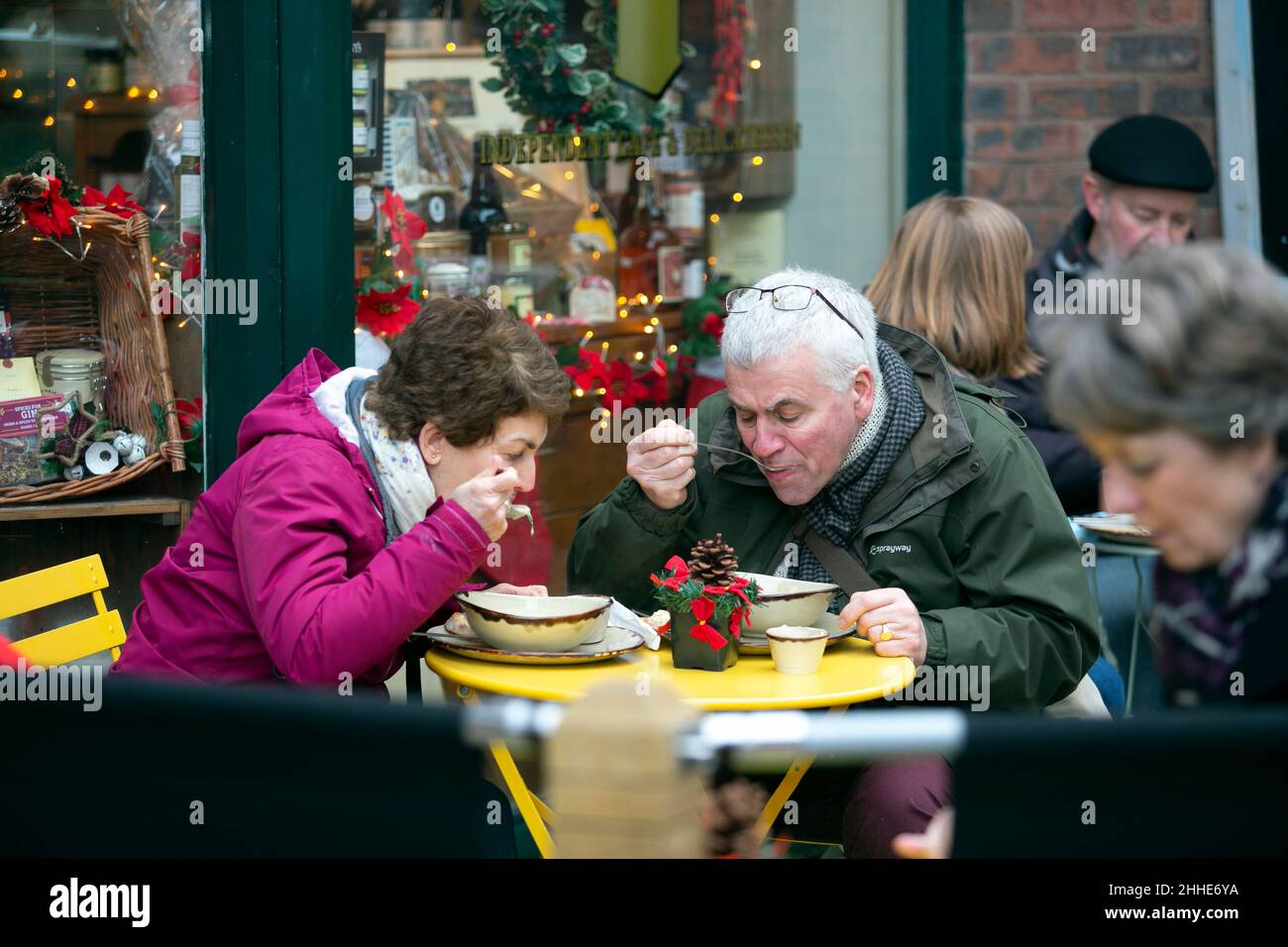 People eating out in York in North Yorkshire as hospitality venues across the United Kingdom get busier on the lead up to Christmas 2021. Stock Photo