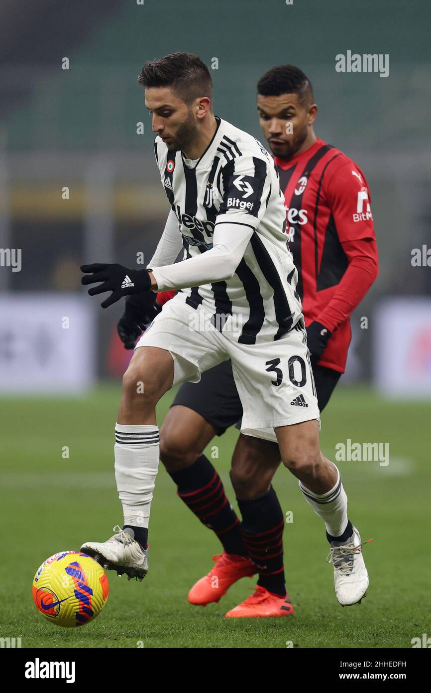 San Siro stadium, Milan, Italy, January 23, 2022, Rodrigo Bentancur  (Juventus FC) is challenged by Junior Messias (AC Milan) during AC Milan vs  Juve Stock Photo - Alamy