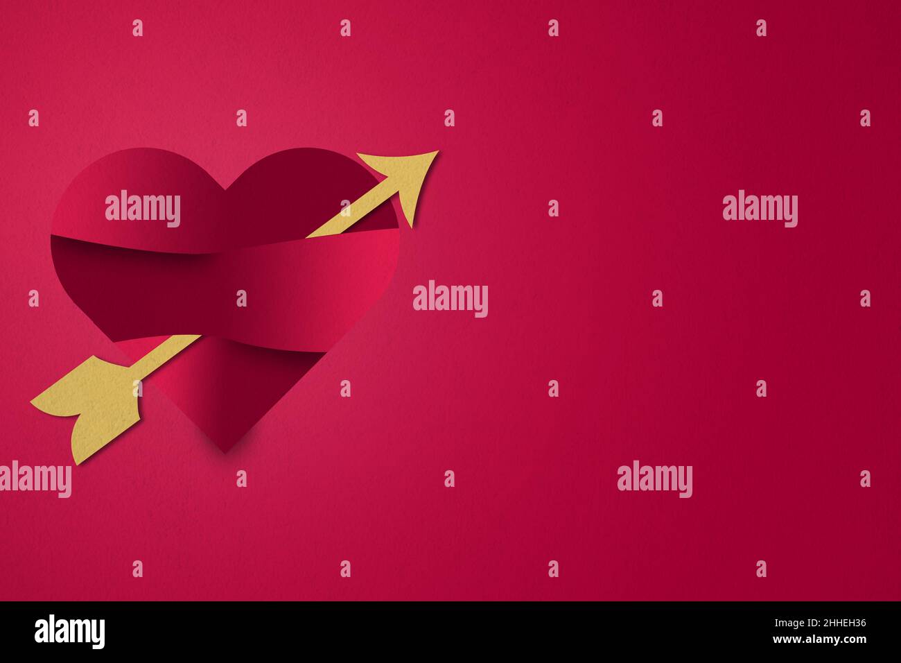 Valentines day red background of heart with arrow Stock Photo - Alamy