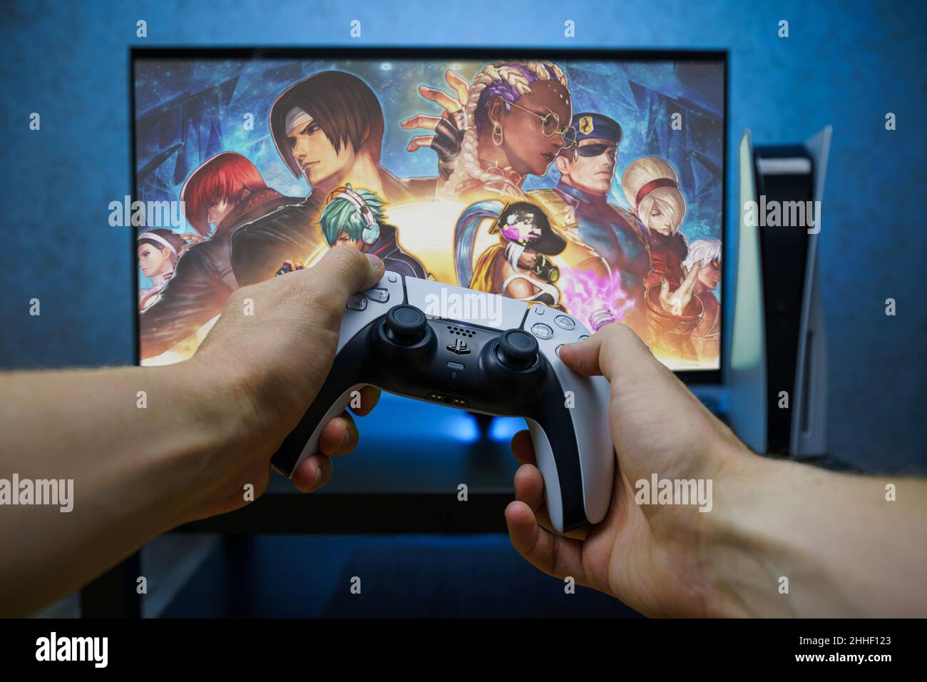 THE KING OF FIGHTERS XV video game. Point of view angle of playing video game with Playstation 5 console. Stock Photo