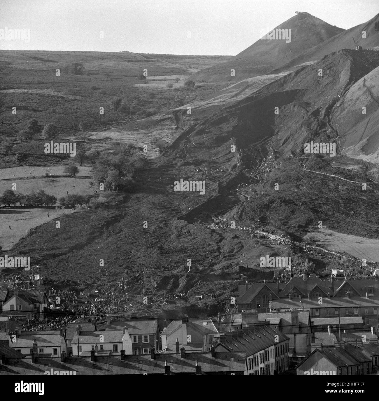 File photo dated 23/10/66 of the path of the coal-tip avalanche through the Pantglas Junior School and houses in Aberfan. The Aberfan clock, which stopped at 9.13am, the moment the Aberfan disaster struck on October 21 1966., has been donated to the Amgueddfa Cymru, the National Museum Wales' permanent collection, and will form part of the collections at St Fagans National Museum of History. Issue date: Monday January 24, 2022. Stock Photo