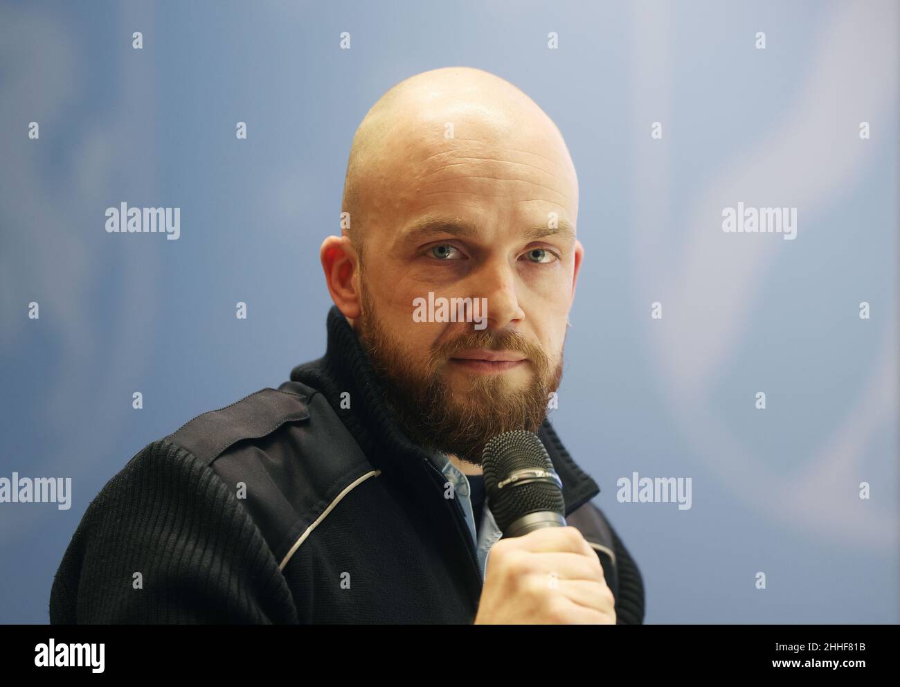 Duesseldorf, Germany. 24th Jan, 2022. Sven Nütten, an employee at the public order office, speaks as a victim of experiences with threats on duty. The Minister of the Interior of North Rhine-Westphalia, H. Reul (CDU), has presented the state-wide prevention network '#sicher im Dienst'. The new network aims to protect public service employees from threats and violence. Credit: Oliver Berg/dpa/Alamy Live News Stock Photo