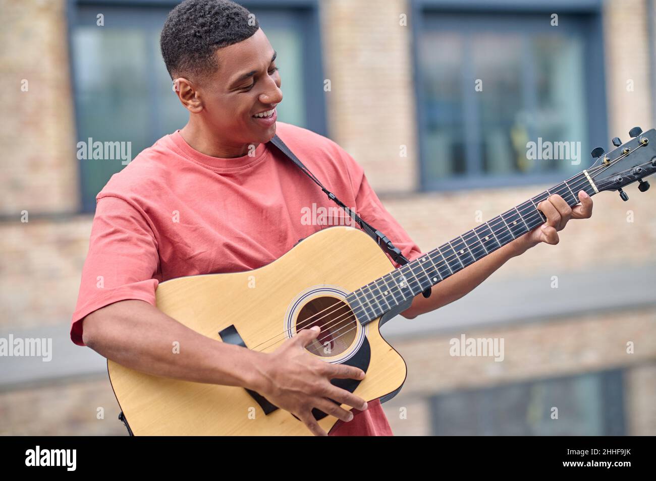 African american man playing guitar hi-res stock photography and images ...