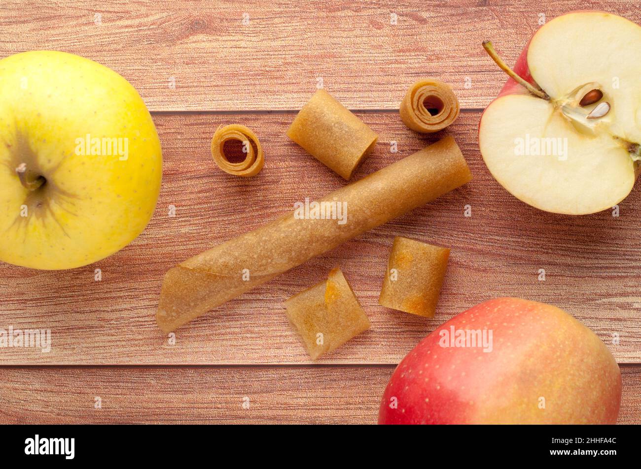 Homemade fruit leather of grape on a wooden background. Pastila. Fruit