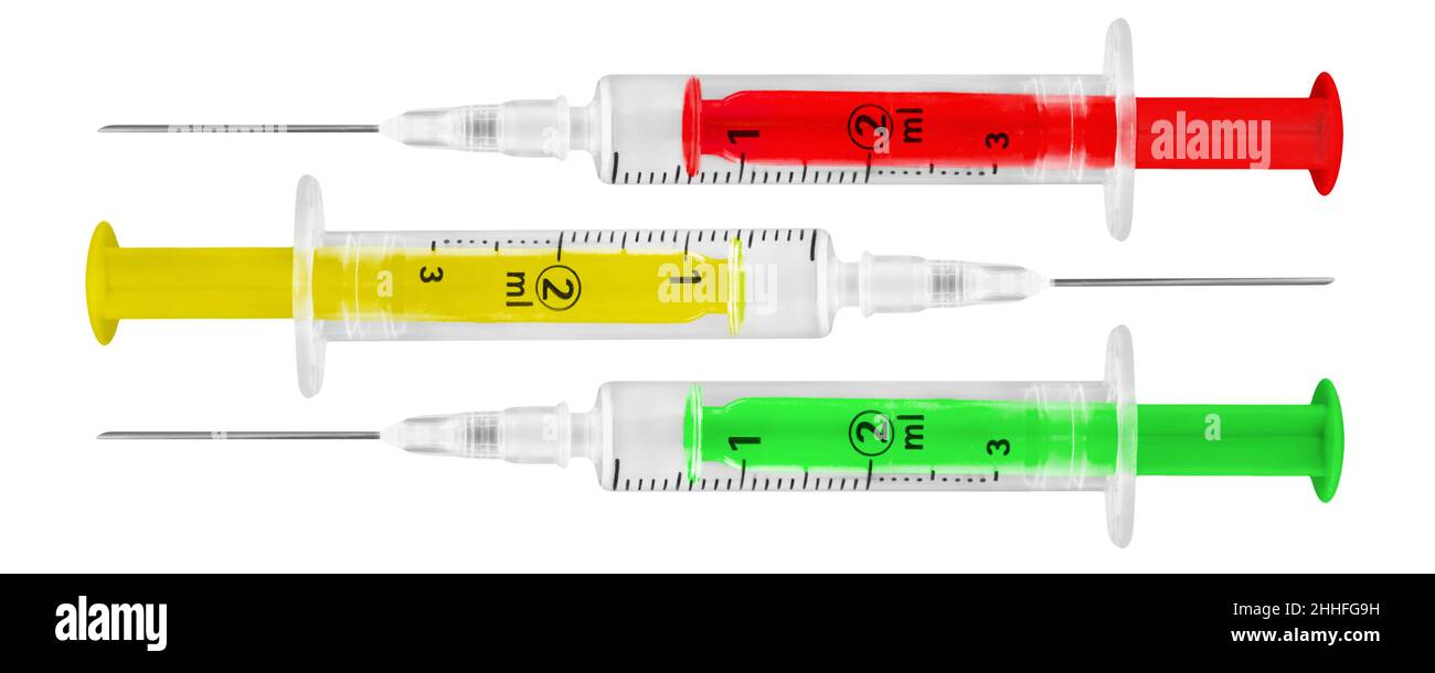 Corona vaccination and 3 injections red green yellow isolated against white background Stock Photo
