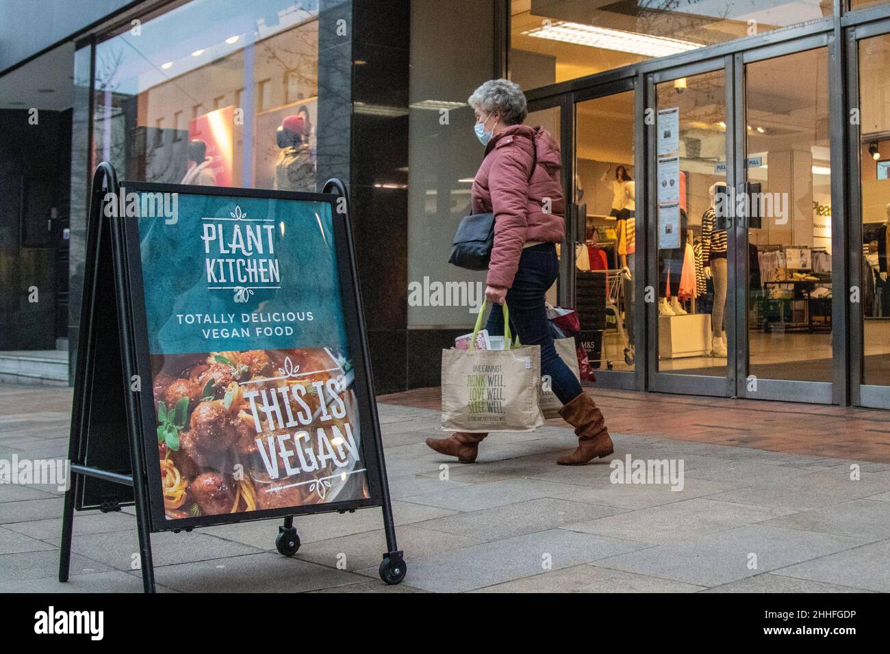 M&S Marks and Spencer Food Hall A board pavement sign advertising vegan foods. Shops shoppers shopping in Preston, UK Stock Photo