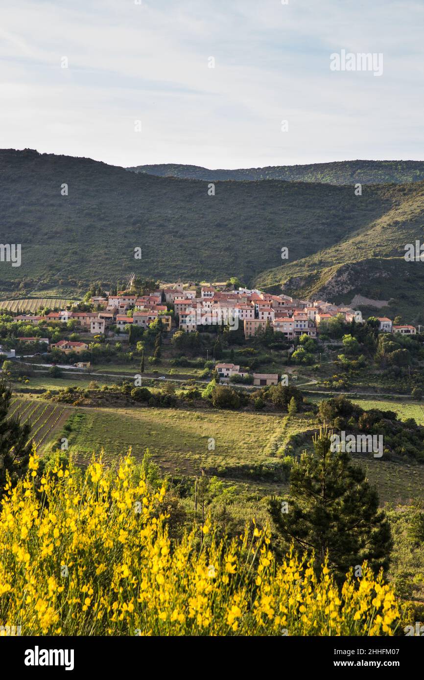 Cucugnan Village and its Windmill and Rolling Landscape in Corbières Region France Stock Photo
