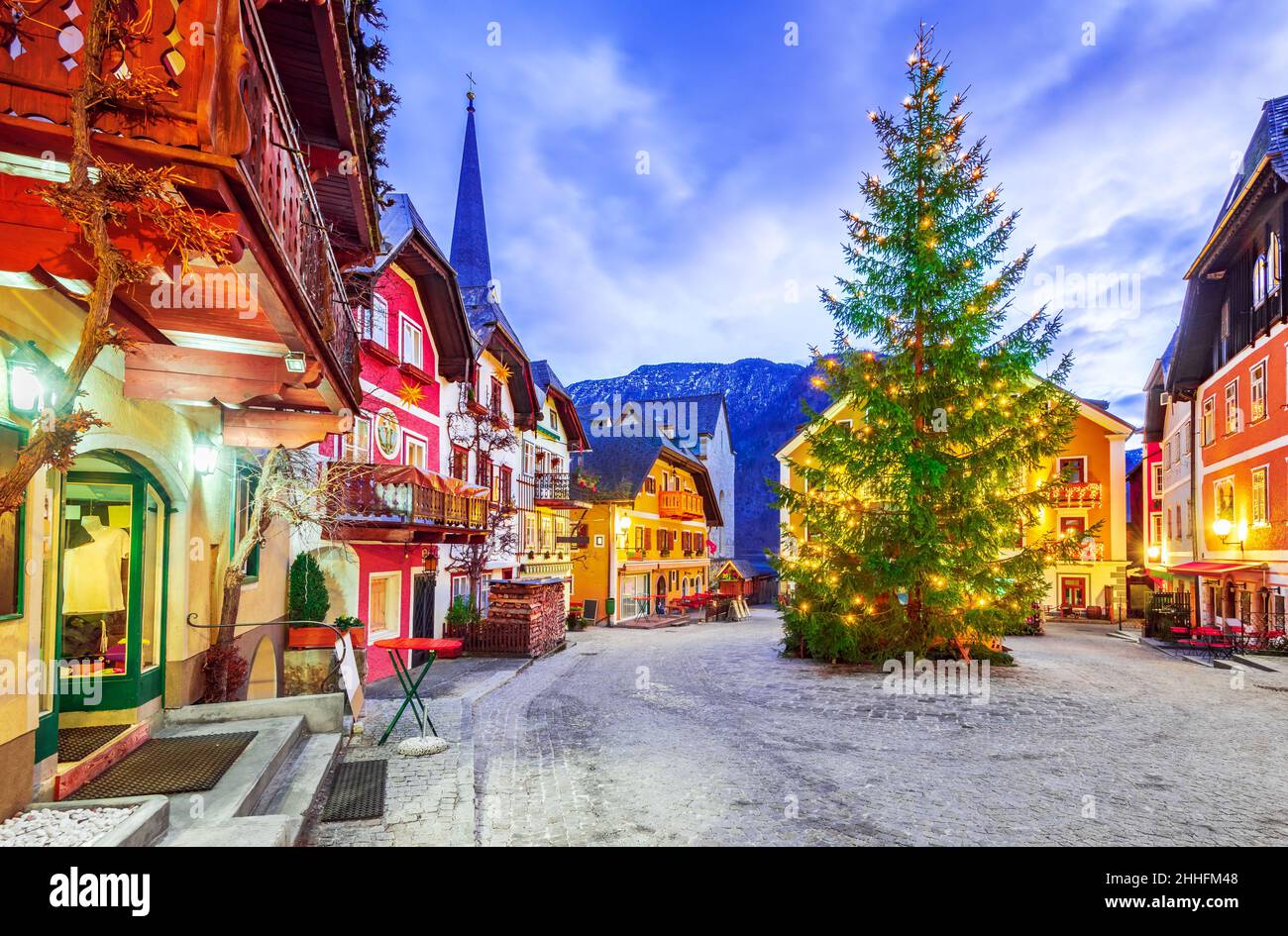 Austria, Hallstatt historical village. Iconic world landmark with old european architecture. Winter christmas tree in Hallstatt Zentrum. Stock Photo
