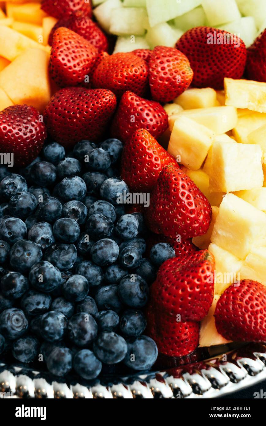 Fruit salad with Pineapple, strawberries, blueberries and Melon Stock