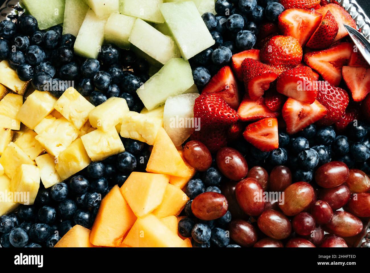 Fruit salad with Pineapple, strawberries, blueberries and Melon Stock