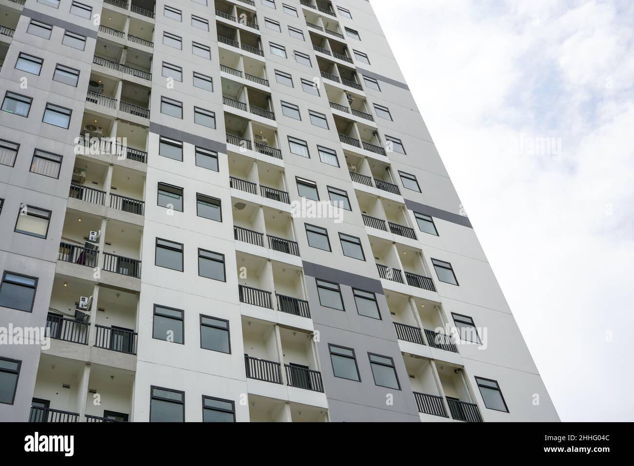 High-rise hotel or apartment buildings are a residential solution for people who live and work in big cities that are very densely populated. Stock Photo