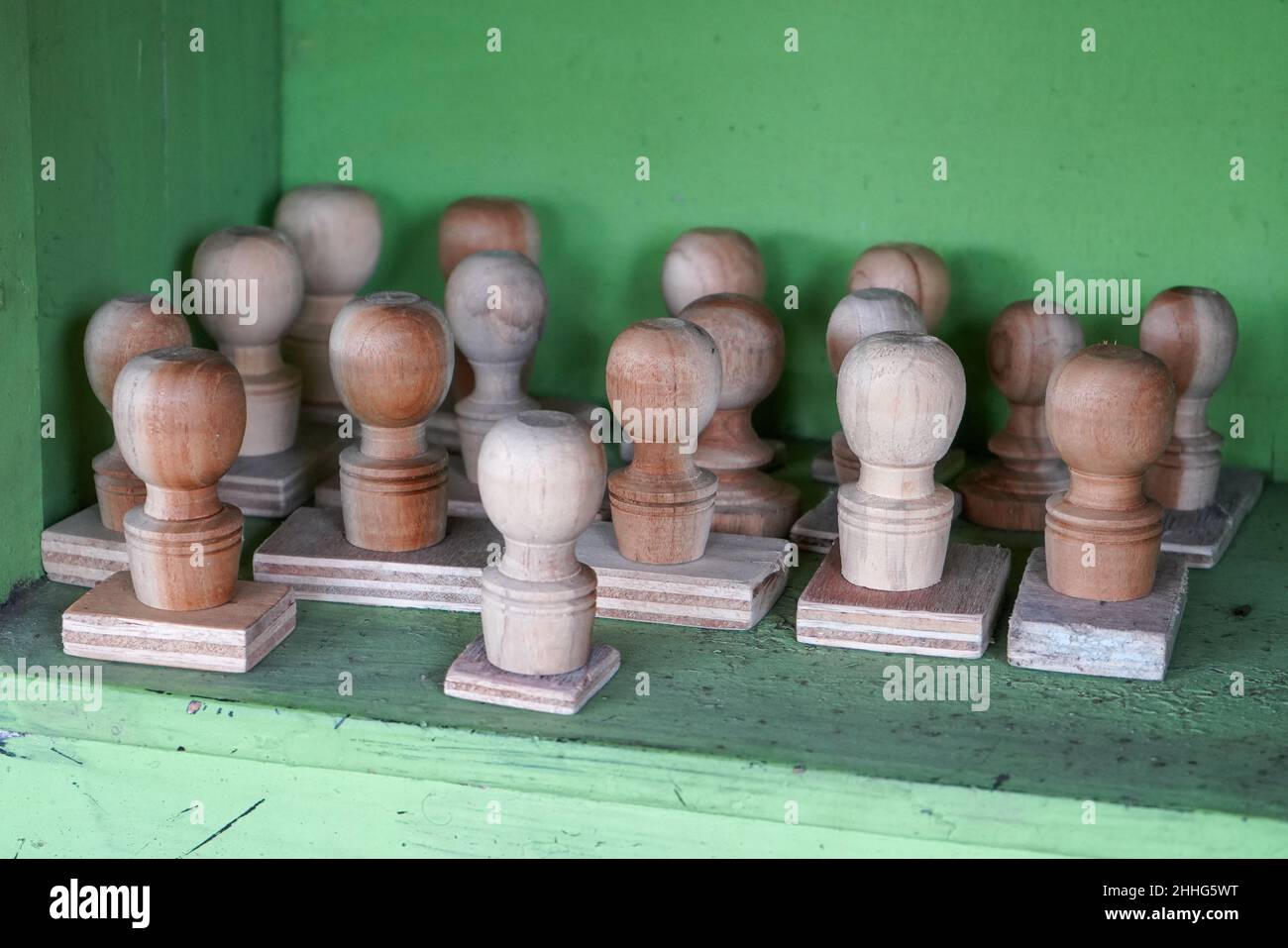 A collection of stamps made of brown wood. Stock Photo