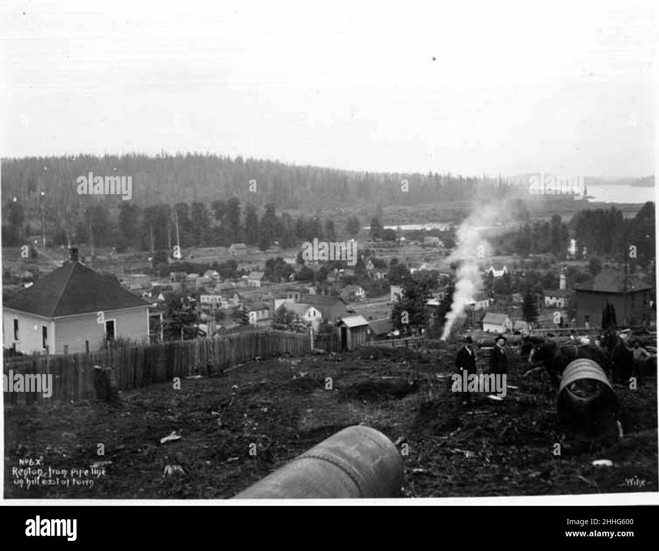 Steel pipe on hill east of Renton with Black River and Lake Washington