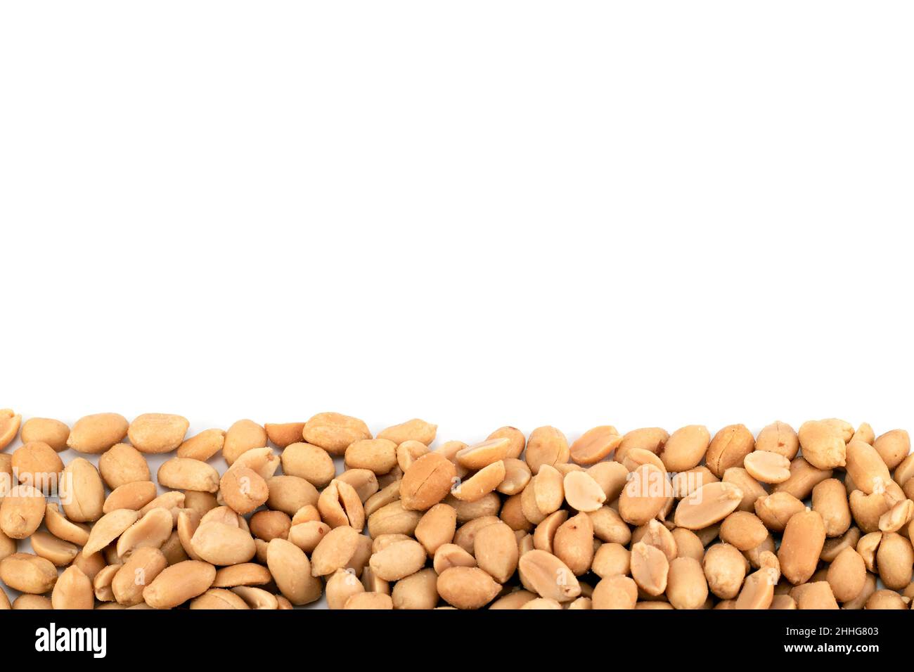 Salted peanuts background. Top view, close up, place for text. Blank for text. Stock Photo