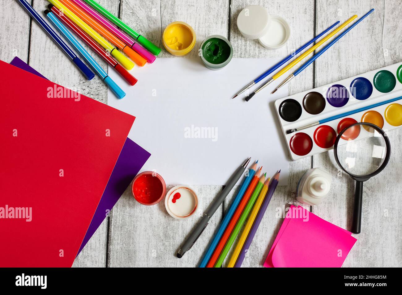 Colorful stationery on a wooden background. learning concept. copy space Stock Photo