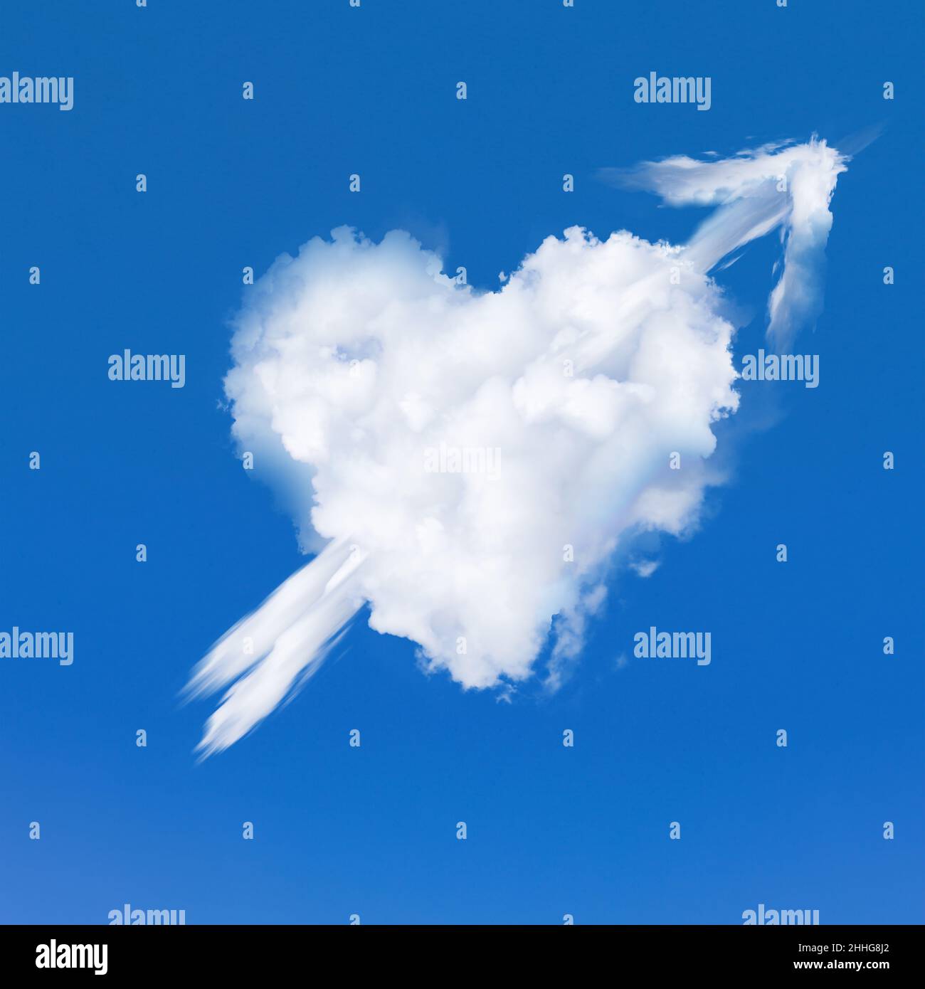 Love heart real white cloud graphic with arrow on a plain sky blue background. Valentine symbol of romance and affection Stock Photo