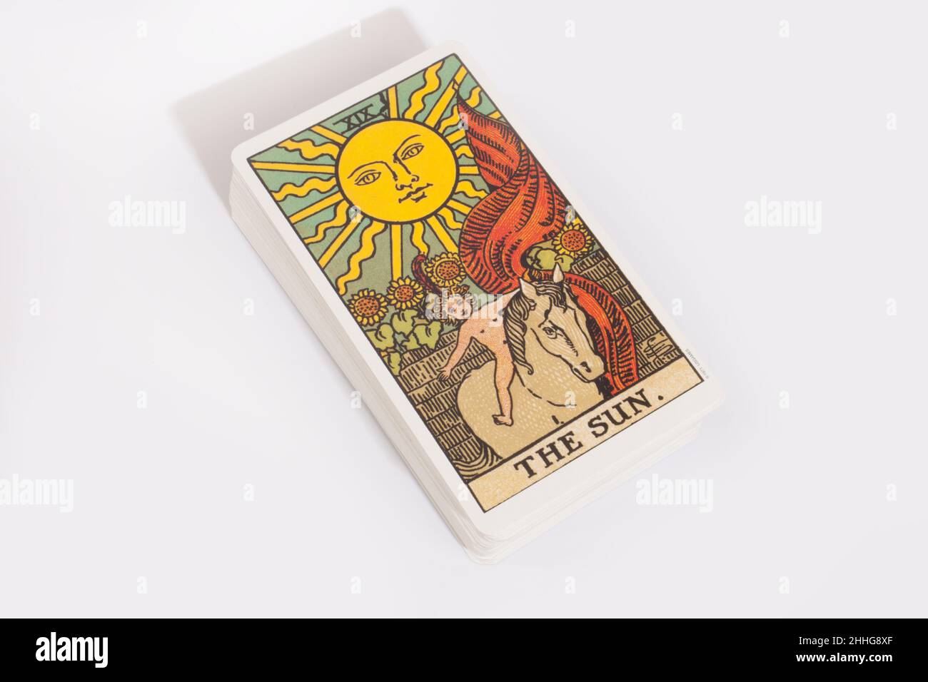 The Sun tarot card from a traditional pack Stock Photo