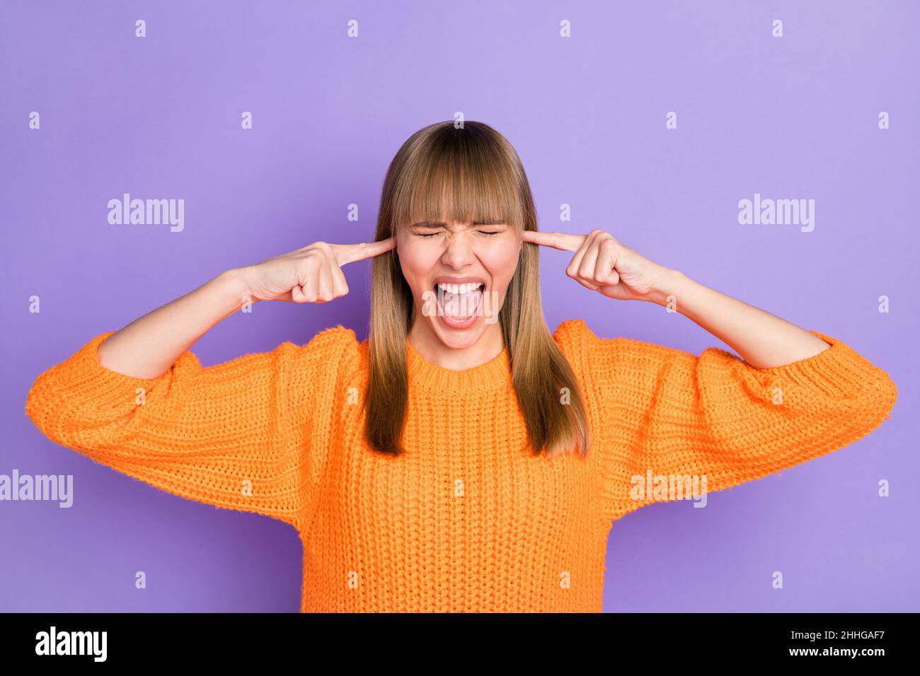 Photo of aggressive lady fingers cover ears shout open mouth wear