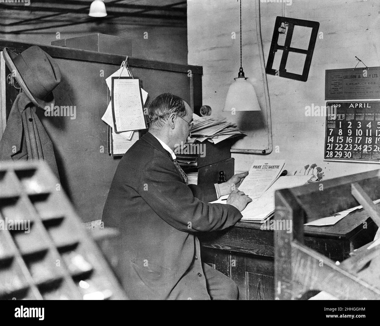 The reader of the Police Gazette. Scotland Yard. London. April 1929. Stock Photo